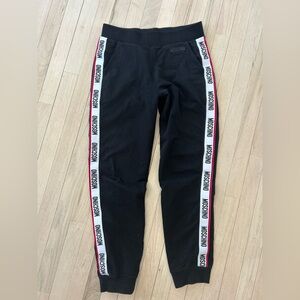 Moschino woman’s Black Sweatpants with White Logo Side Tape and Red Trim